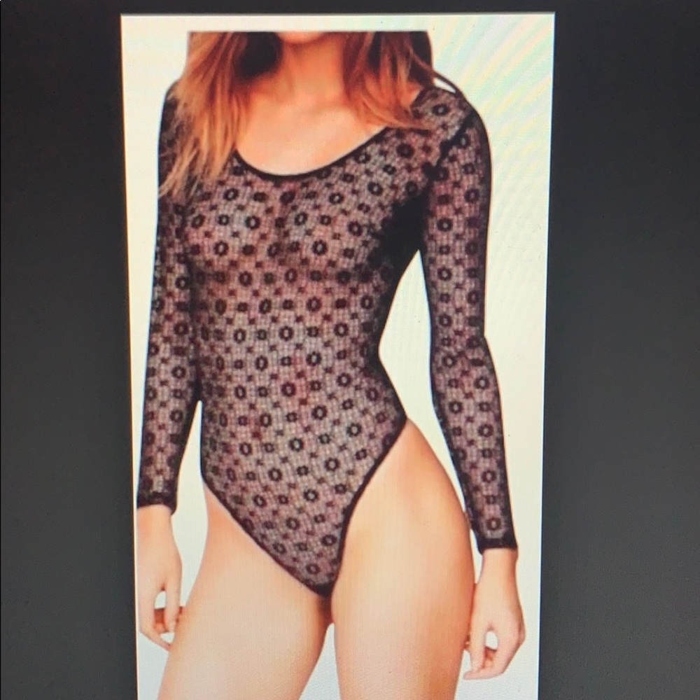 Never worn Lace long sleeve body suit